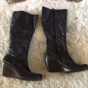 brand new brown leather bandolino wedge boots.